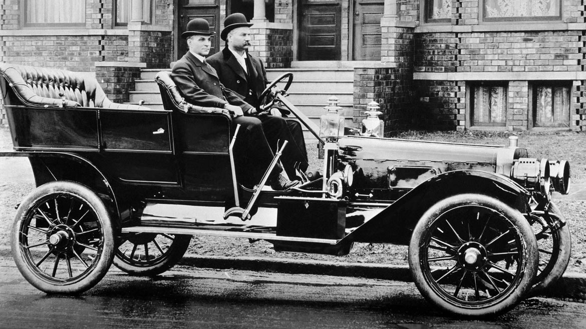 Henry Ford, left, and A. O. Smith, sit in a Ford built on an A. O. Smith frame.